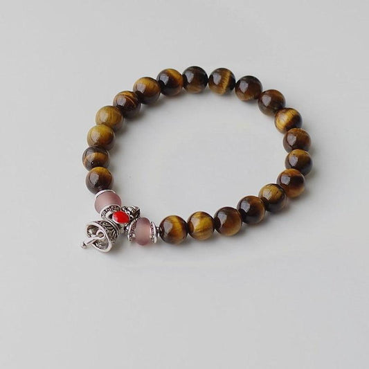 Lucky Bracelet in Tiger's Eye and Bell Charm | Bracelet | Bell Charm, Bracelets, new, OCU1, Tiger's Eye | Guided Meditation